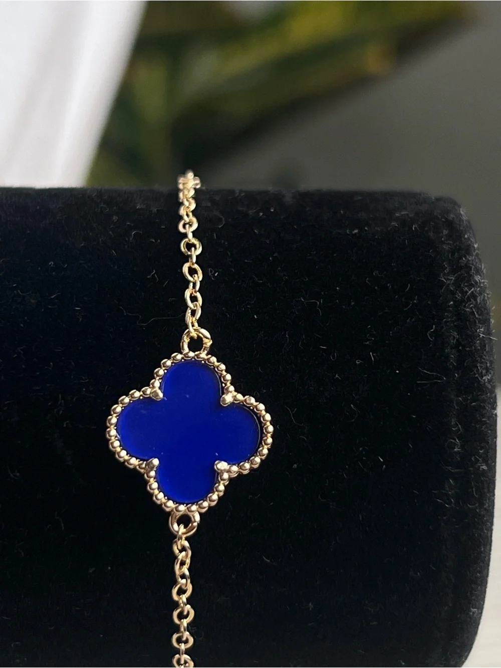 Gold Chain Bracelet with singular  Blue Clover Pendant